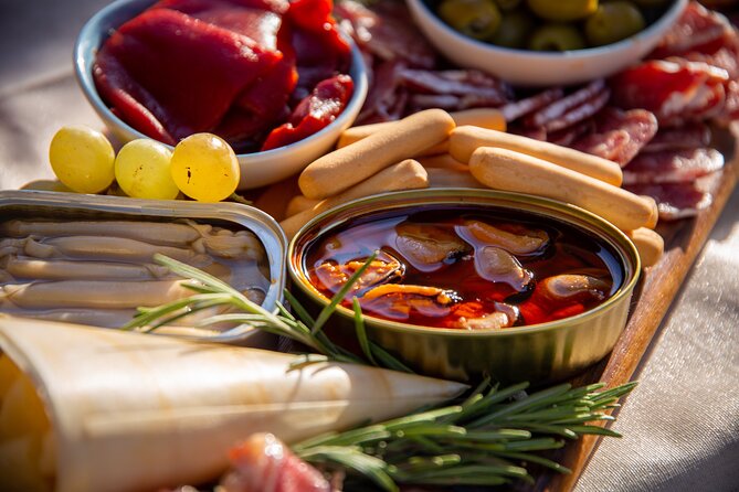 A 2 hours Local Tapas and sailing adventure in Barcelona - The port, Hotel W, and Montjuic