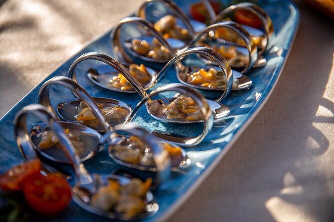 A 2 hours Local Tapas and sailing adventure in Barcelona - Meeting at Marina Vela