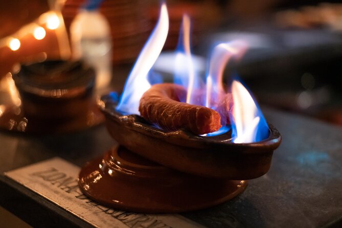A True Taste of Lisbon: Portuguese Tapas, Wine & Surprise Drink - Starting at Praça Luís de Camões at 7:00 pm