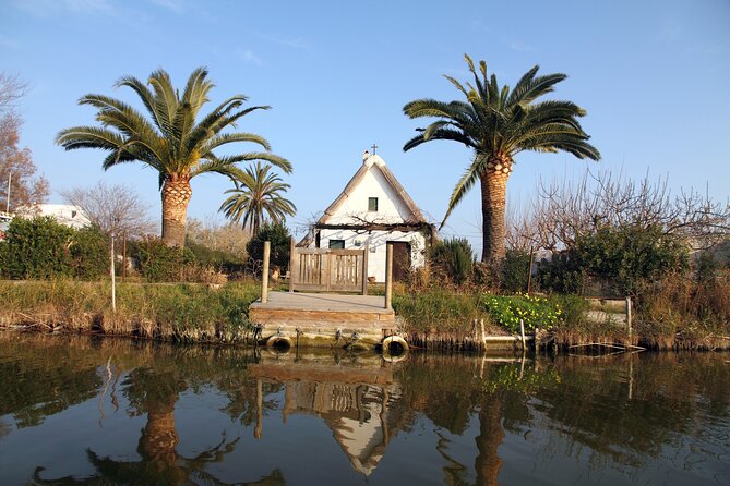 Albufera Private Day Tour: Paella, Boat Cruise and Nature Walk - Tancat de Mília lookout tower and birdwatching