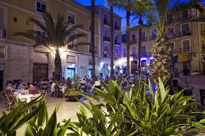 Alicante Wine Tasting and Tapas for Foodies - Walking between small local food spots