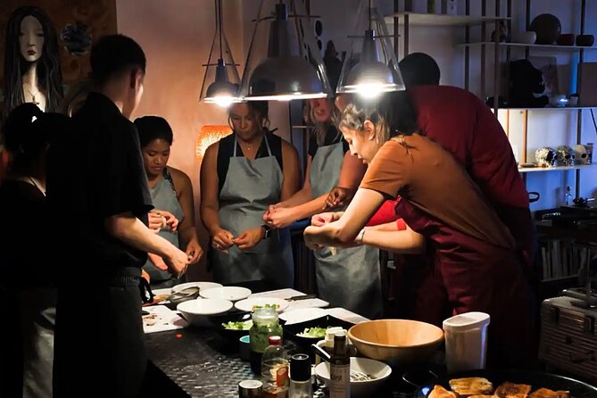 Barcelona Authentic Paella and Sangria Cooking Class - Making sangria before sitting down to eat