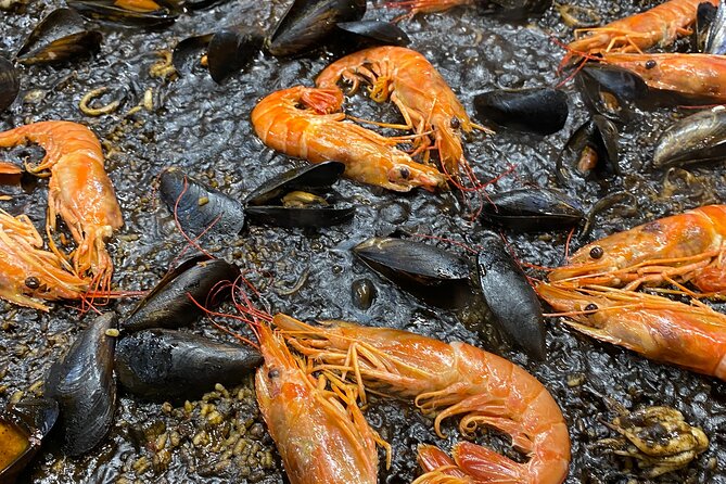 Barcelona: Black Ink Seafood Paella Cooking Class - A possible Boqueria Market addition