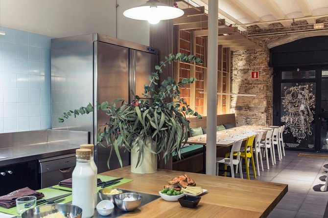 Barcelona Culinary Experience: Paella & Tapas Cooking Class - Wine, snacks, and the value of the $90.74 price