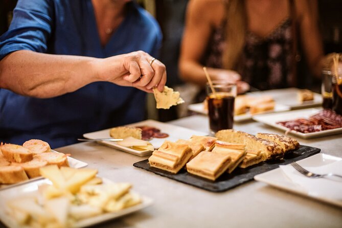Barcelona Gothic Quarter Tapas & Taverns Food & Wine Tour - Walking through Roman Barcelona and medieval lanes