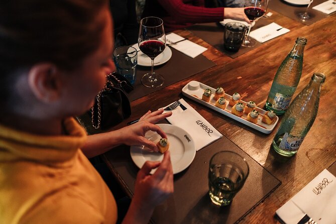 Barcelona: Guided Food Walking Tour with Tapas and Wine - Four tables, two old neighborhoods