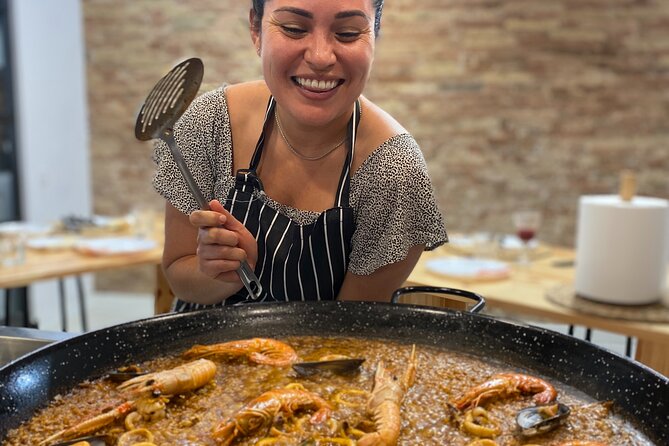 Barcelona Paella Cooking Class & Boqueria & Hofmann-Trained Chefs - Start with pan con tomate, jamón, and Cava