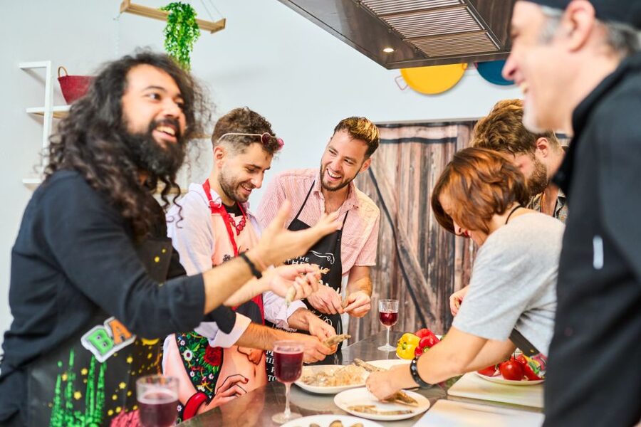Barcelona: Paella Cooking Class with Market Visit and More - Making Paella, From Sofrito to Socarrat