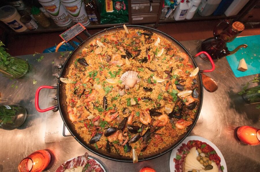 Barcelona: Paella Cooking Experience & Boqueria Market Tour - Starting with seafood at La Boqueria