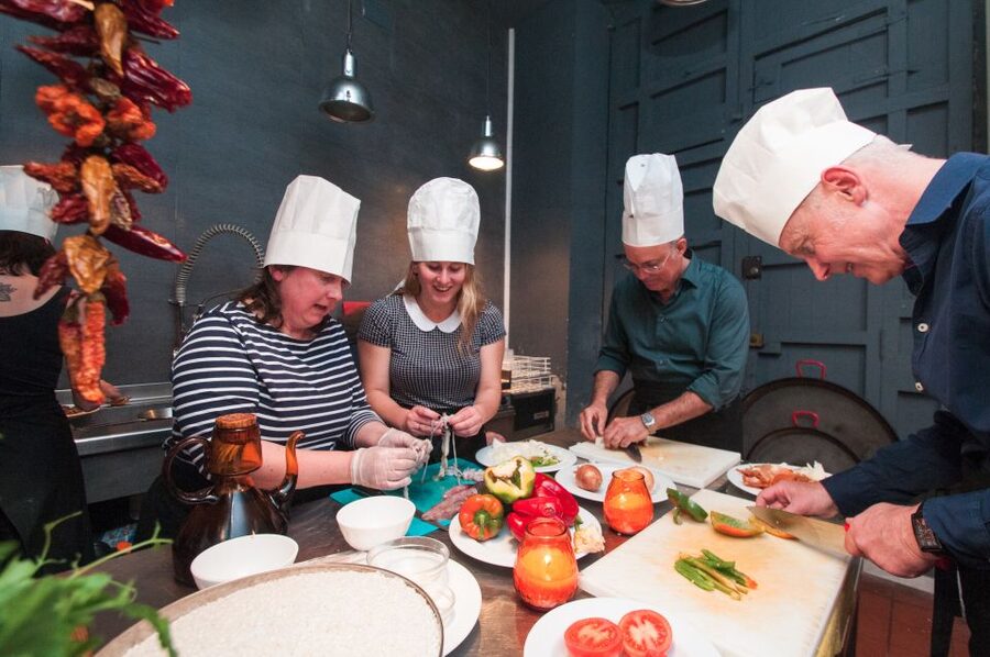 Barcelona: Paella Cooking Experience & Boqueria Market Tour - Sangria, tapas, and a social table