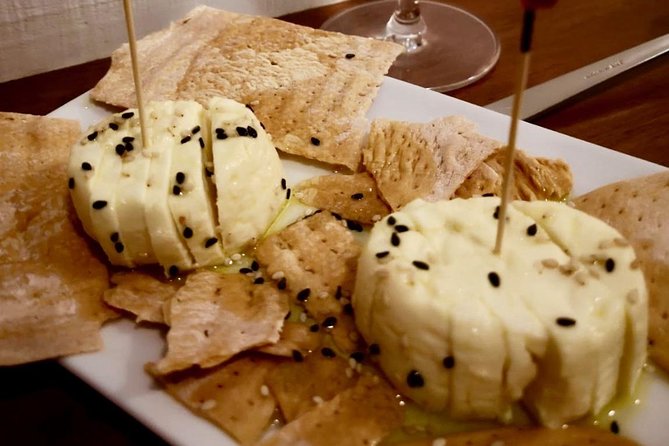 Barcelona Poble Sec Tapas & Wine Tour - Stop two: memorable bravas on Carrer del Roser