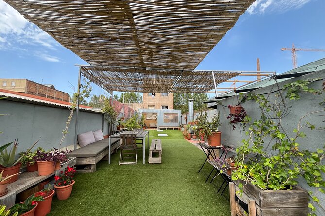 Barcelona Rooftop Paella Cooking Class with Sangria & Local Host - The rooftop setting and the weather question