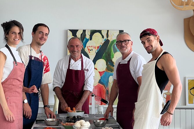 Barcelona: Rooftop Tapas & Sangria class with a Local Chef - Cooking tapas inside a Barceloneta home