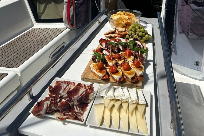 Barcelona: Sailing Tour with Tapas, Drinks, Swim & Sunset Option - The swim stop in the Mediterranean