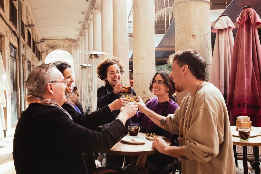Barcelona: Small Group Gothic, Tapas & Churros Tour! - The main meal: wine, tapas, and the porró