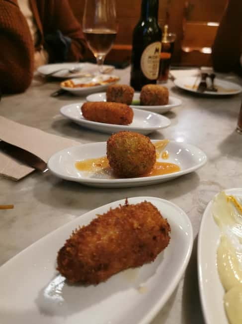 Barcelona: Tapas and Wine at the Hidden Bodegas Experience - Starting at Les Rambles and Liceu