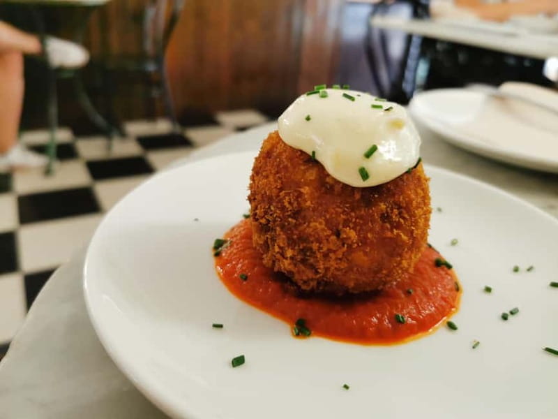 Barcelona: Tapas and Wine at the Hidden Bodegas Experience - Family-run taverns instead of polished tourist rooms