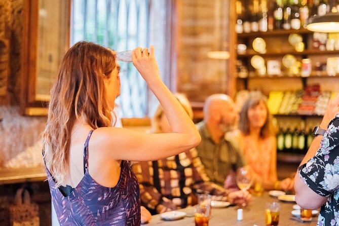 Barcelona Tapas and Wine Private Walking Tour - Passeig del Colom and the shift toward the waterfront