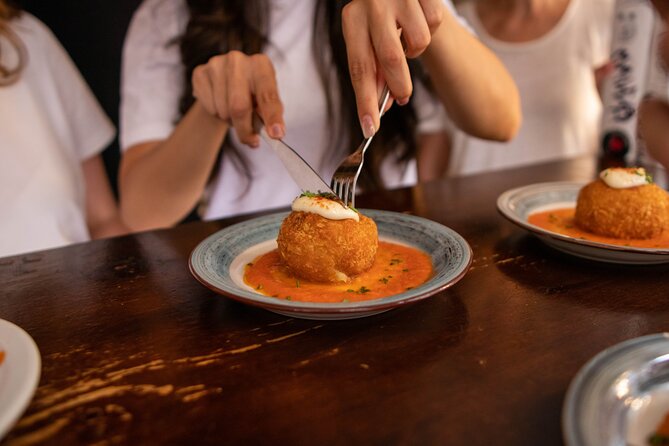 Barcelona Tapas Food Tour, Taverns, History & Local Culture - Rambla de Catalunya and the move toward central Barcelona