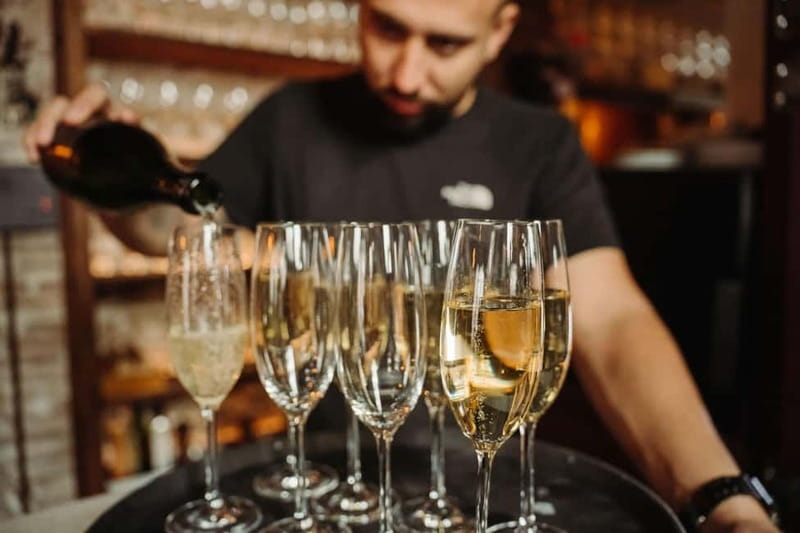 Barcelona: Tapas & Wine Tour in Born & Gothic Quarter - A small group and the guide’s role