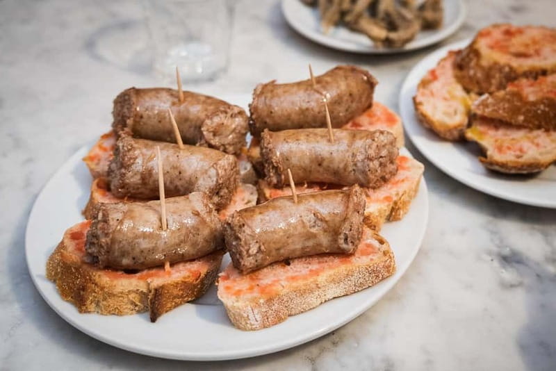 Barcelona: The Ultimate Local Tapas & Drinks Food Tour - Starting at Jaume I and entering the Gothic Quarter