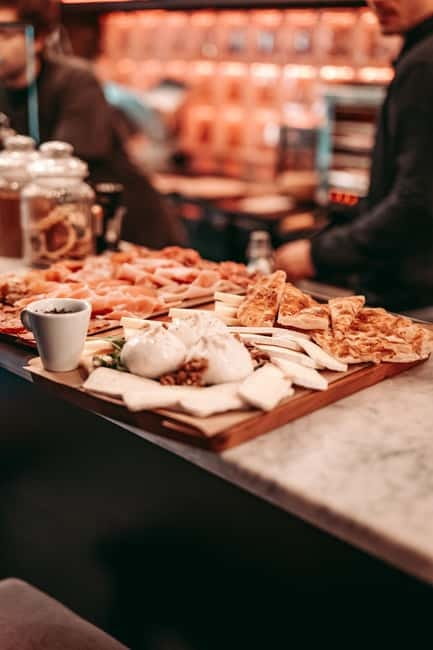 Barcelona: Tipsy Tapas & History Tour in the Gothic Quarter - First stop: two traditional bites in a tucked-away bar