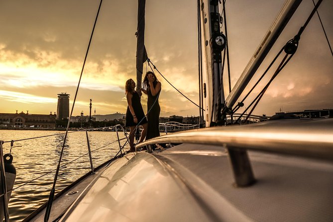 Barcelona Unique Sunset Sailing Experience with Tapas & Open Bar - Drinks and the onboard atmosphere