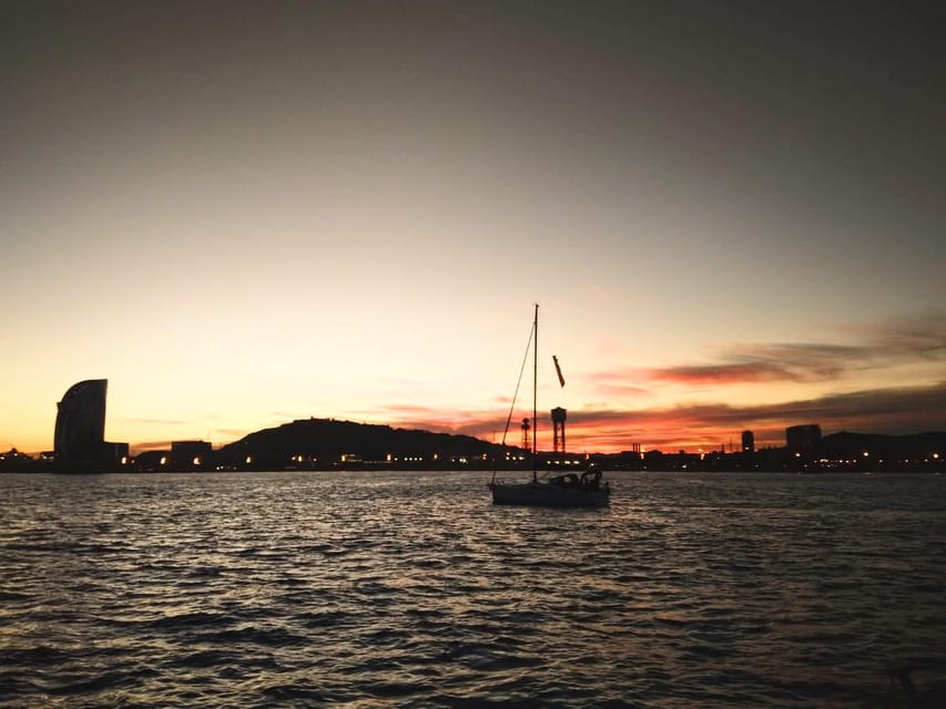 Barcelona: Unique Sunset Sailing Tour with Tapas & Open Bar - Tapas that work as a snack, not a full meal