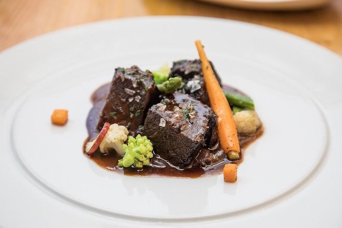 Barcelona Wine and Gourmet Tapas Tour - Three stops, from croquetas to Catalan-style cannelloni