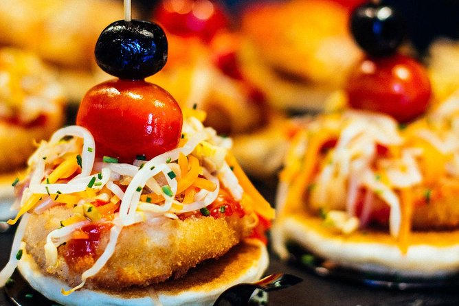Barcelona With Locals: Wine and Tapas Private Tour - Walking toward Carrer de Blai