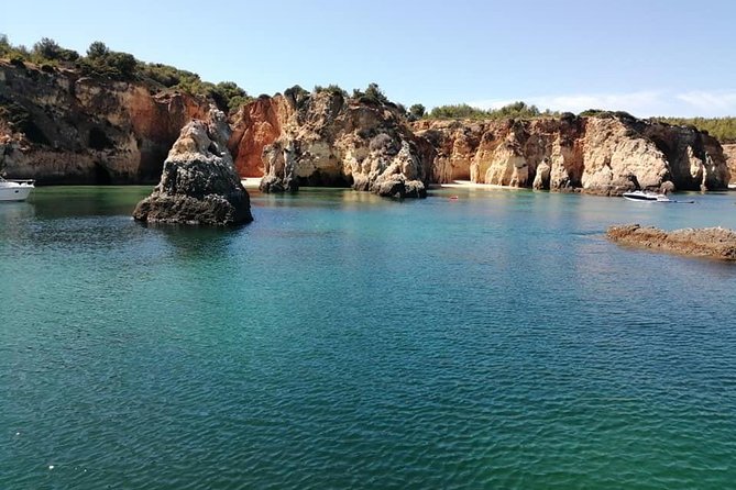 Benagil private yacht from lagos with drinks, tapas, paddle boards and kayak - Seeing the Benagil cave cathedral