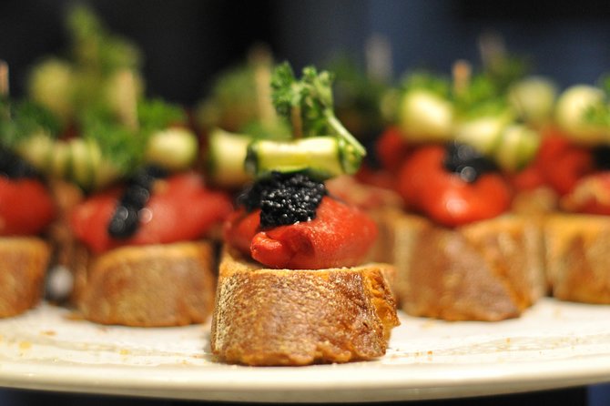 Born to Eat: Gourmet Tapas & Wine Small Group Tour in Old Barcelona - Passeig del Born and the meaning of the name