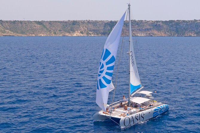 Catamaran sailing at sunset with tapas Palma de Mallorca - Booking, weather, and cancellation details