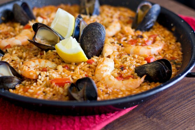 Cook Paella & Tapas + Market Tour in Barcelona (4-Course Meal) - Making tortilla with potatoes, onions and eggs