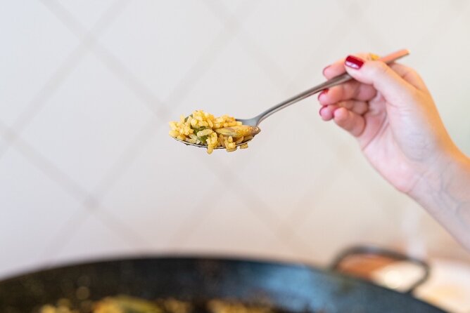 Cook your Paella with Purchase to Russafa Market in Valencia - Timing, meeting point, and practical details
