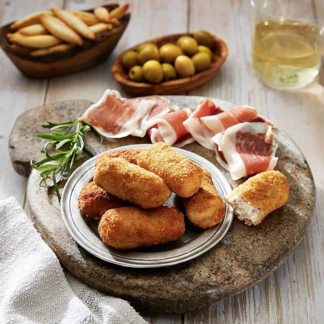 Eat Like a Local: Hidden Gràcia Catalan Tapas Tour Barcelona - Casa Pagès and the famous Barcelona bomba