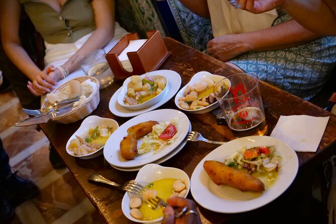 Eating Seville: Tapas, Drinks and Local Flavors Tour - Starting beside the Cathedral and Giralda
