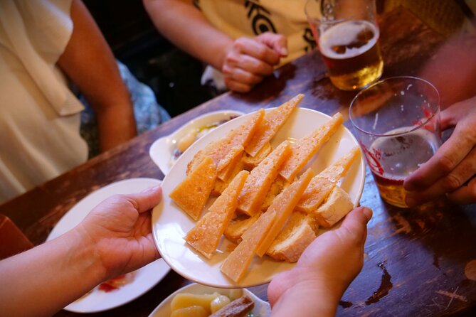 Eating Seville: Tapas, Drinks and Local Flavors Tour - Pork cheeks and shrimp omelette at La Antigua Bodeguita
