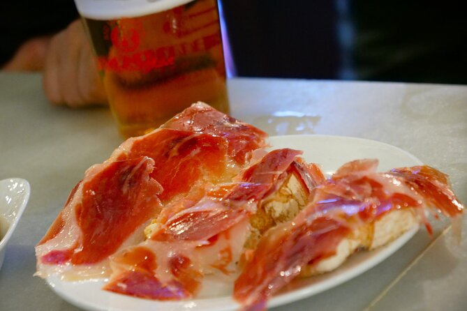 Eating Seville: Tapas, Drinks and Local Flavors Tour - Flaming chorizo and tinto de verano at Bodega La Aurora
