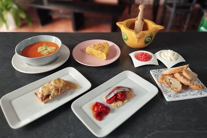 Evening Spanish Tapas Cooking Class with Live Guitar Music - Food stories and local context