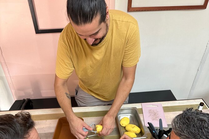 Evening Spanish Tapas Cooking Class with Live Guitar Music - Dinner, conversation, and Spanish guitar
