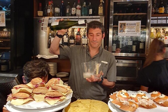 Full-day private Bilbao tour (Guggenheim museum & full pintxo lunch included) - Crossing the Zubizuri Bridge into the Ensanche