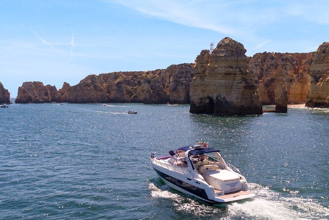 Full day private yacht from lagos with drinks, tapas, paddle boards and kayak - A private day on the Algarve coast