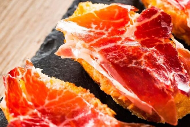 Gastronomic Tour: Discover the best “Wines and Tapas of Madrid” - Olives and the old tavern feel at Mesón Rincón de la Cava