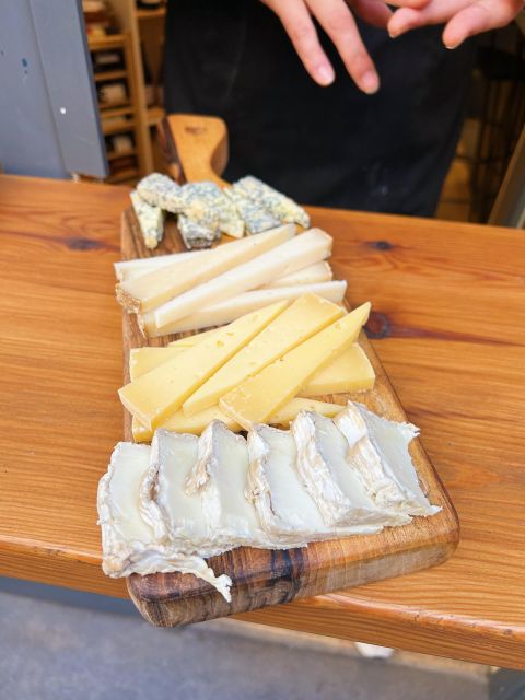 Girona Evening Food Tour & Tapas Bar Experience - Tapas and wine on Carrer de les Olles