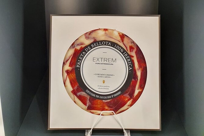 Gourmet Tasting of Iberian Ham Oil and Wine Small Group in Madrid - The main plate: ham, loin, and Iberian sausages