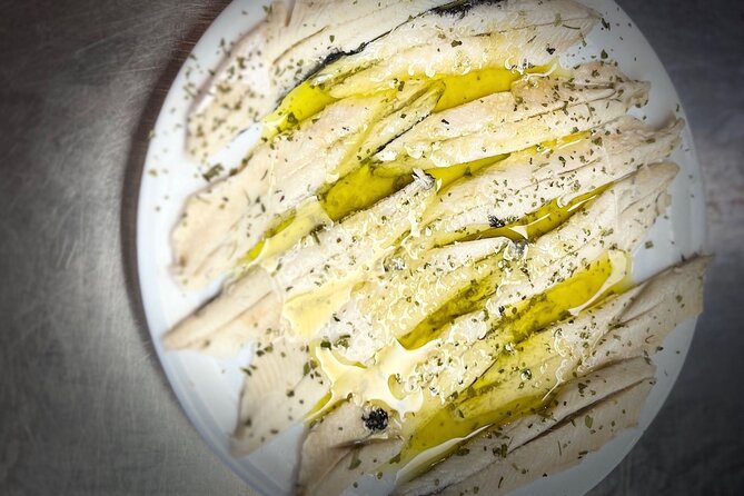 Half Day Private Madrid Tapas and History Walking Tour - The quiz and small Madrid souvenirs