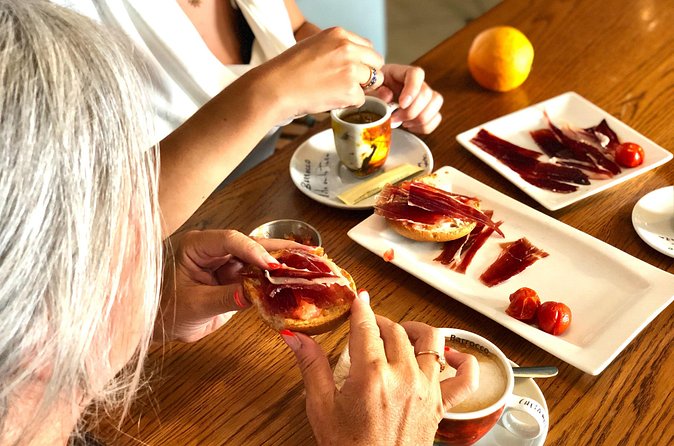 Iberian ham experience with traditional breakfast Madrid center - What the 12-person limit means