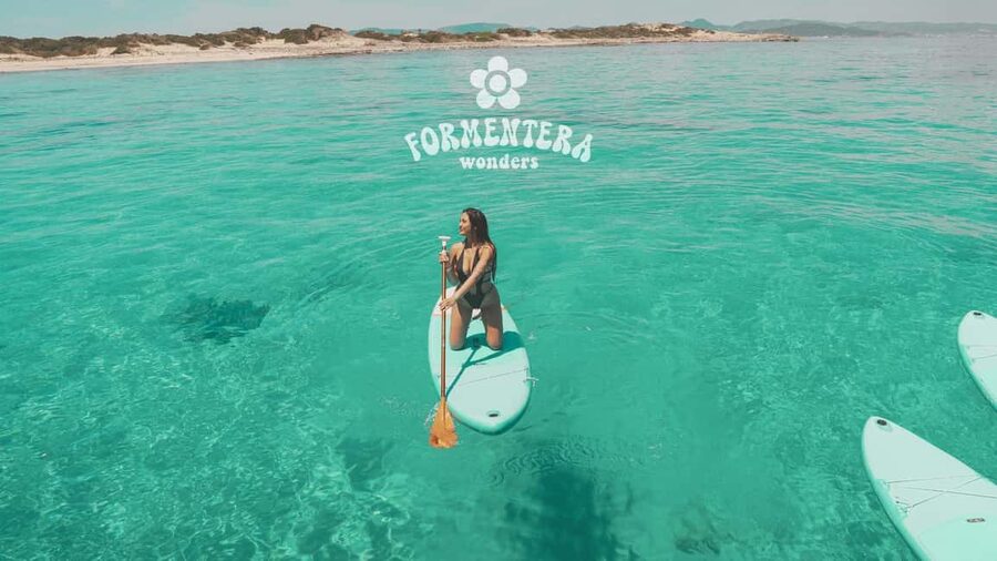 Ibiza: Boat Trip to Formentera with Open Bar and Paella - Paella, fruit, and an open bar
