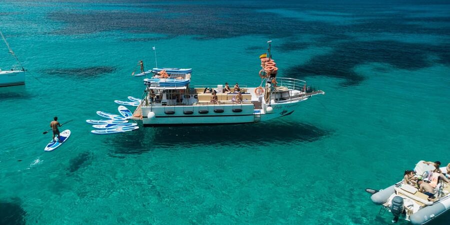 Ibiza: Scenic Sunset Cruise with Tapas and Drinks - Swimming, Snorkelling, and Paddle Surf